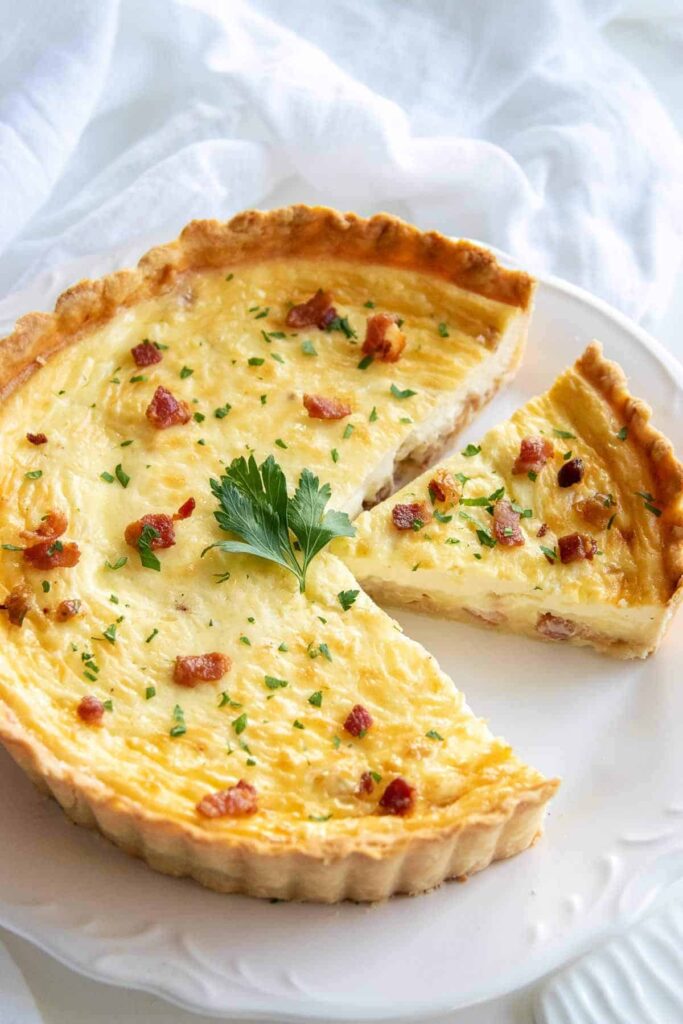 Classic Quiche Lorraine Recipe Beautiful Flaky Pastry Crust Is Paired With A Delicious Savory Egg Custard. Perfect For Breakfast Or Brunch. 1 4 683x1024 