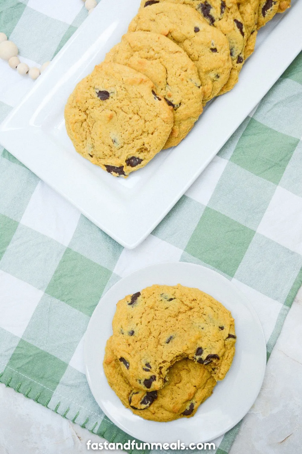 soft pumpkin chocolate chip cookies on white plates